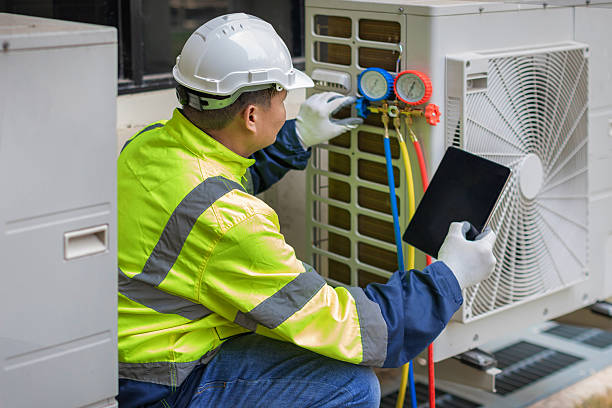 Professional Ac Installation technician working in Cable, OH